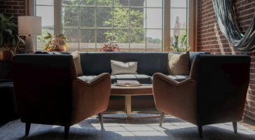 carson-vara-rdlaqlKStNQ-unsplash two armchairs, coach and small table in a cozy light room